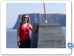 Lizz at the actual north cape with the tourist north cape in the background!